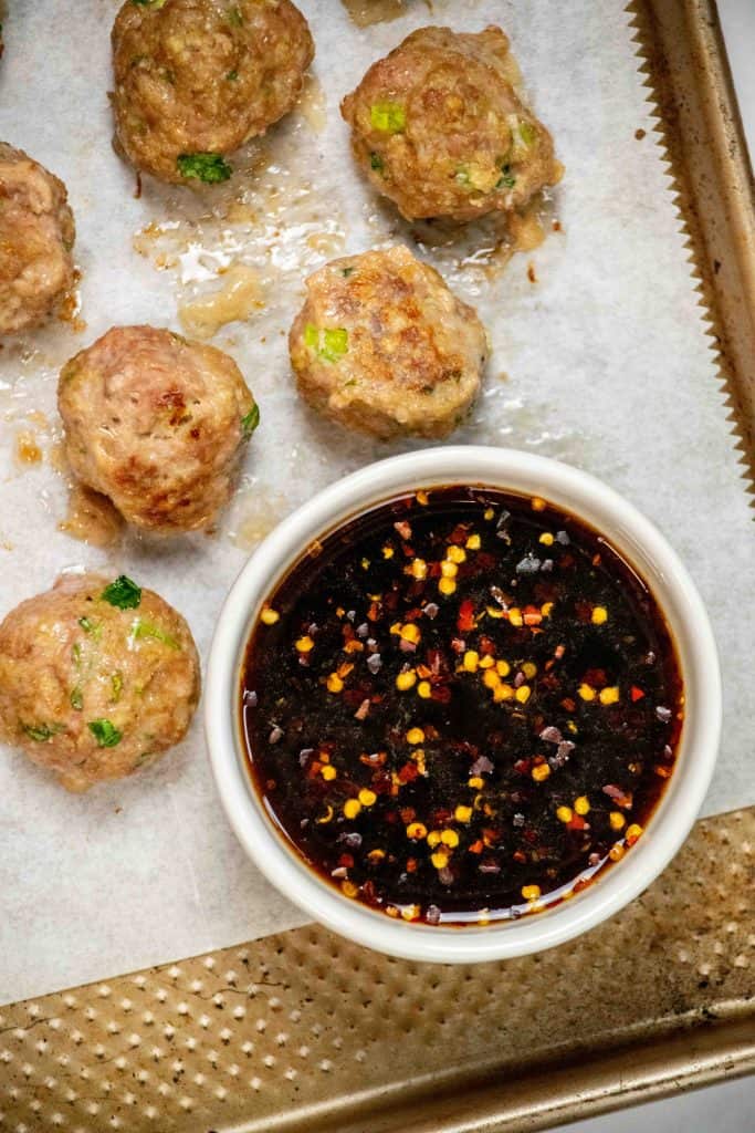 whisk together sauce while meatballs bake
