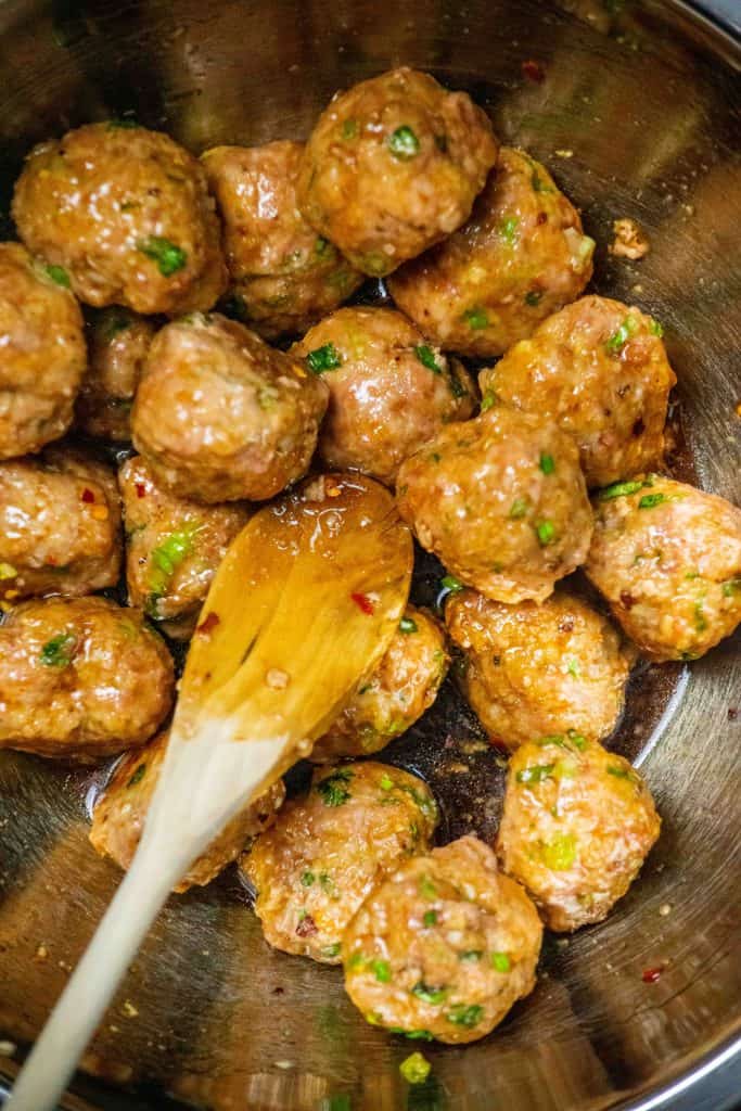 toss meatballs in sauce to coat
