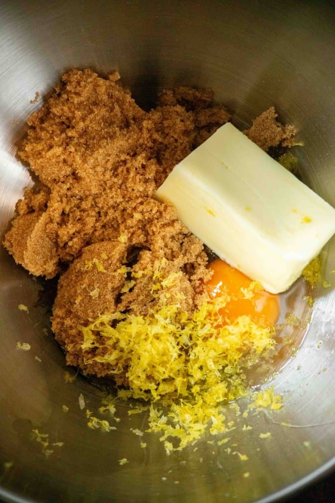 add the butter, lemon zest, vanilla, and brown sugar to the bowl of a stand mixer