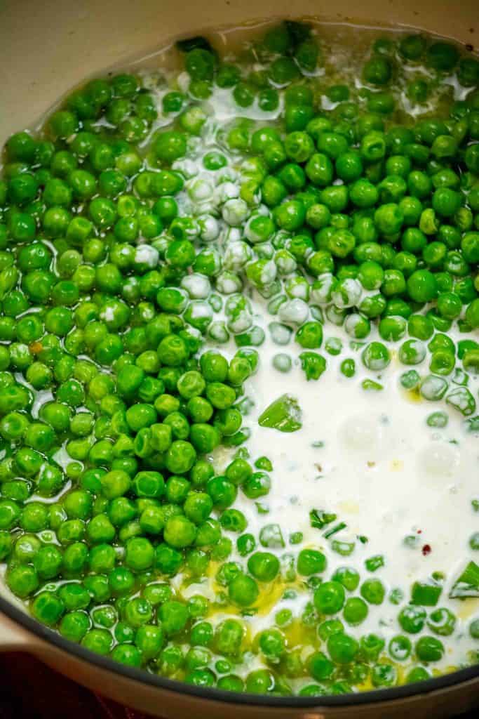 add peas, cream, and wine to the pot