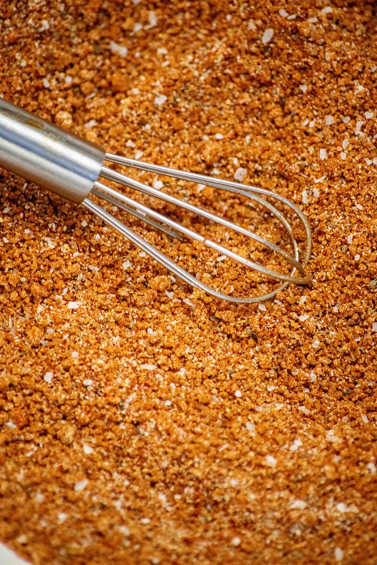 Rib dry rub being whisked together.