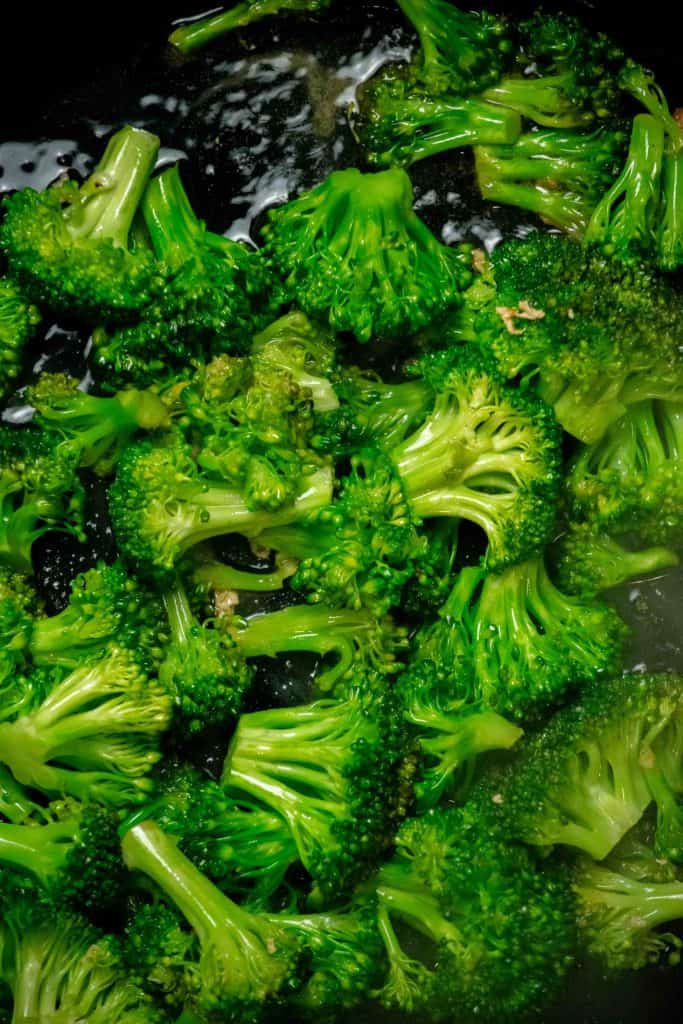 cook broccoli until crisp-tender, and most liquid is evaporated