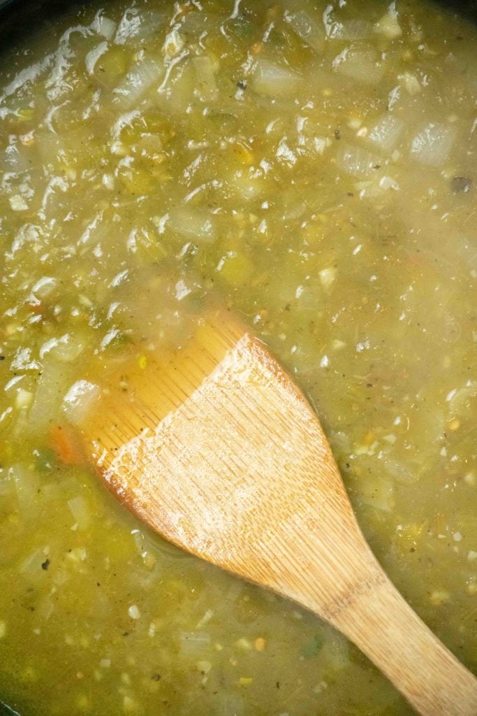Add salsa and chicken stock, and cook until slightly thickened