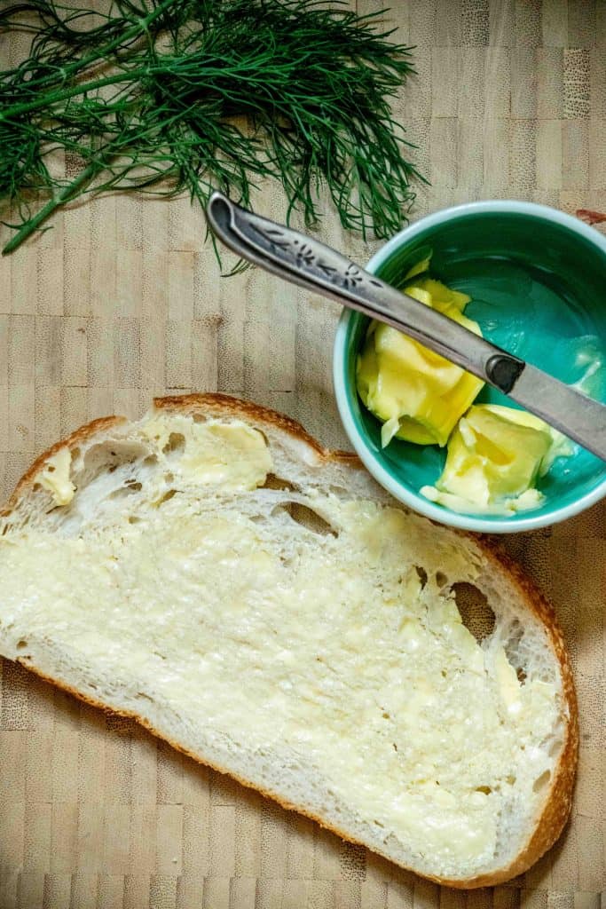 spread softened butter on both sides of the bread