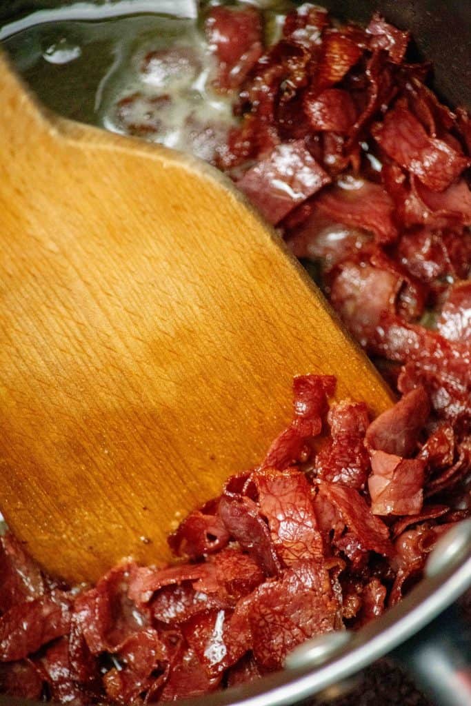 add sliced beef to butter, and cook until crisp