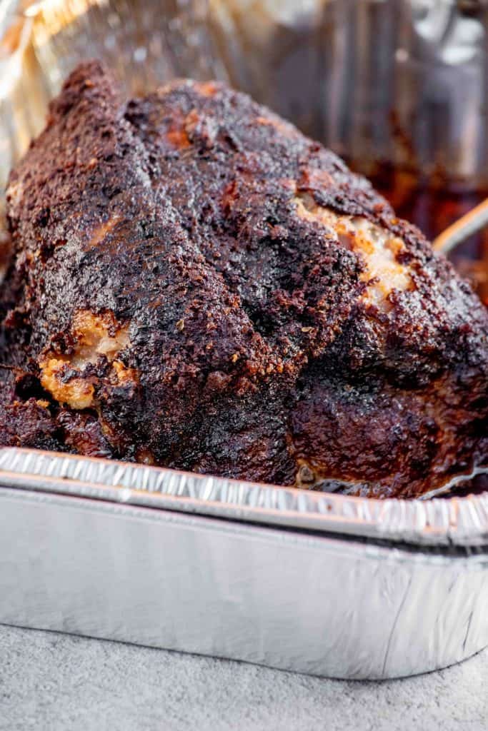 smoke pork 4 hours, flip over, cover, and smoke 4 more hours 