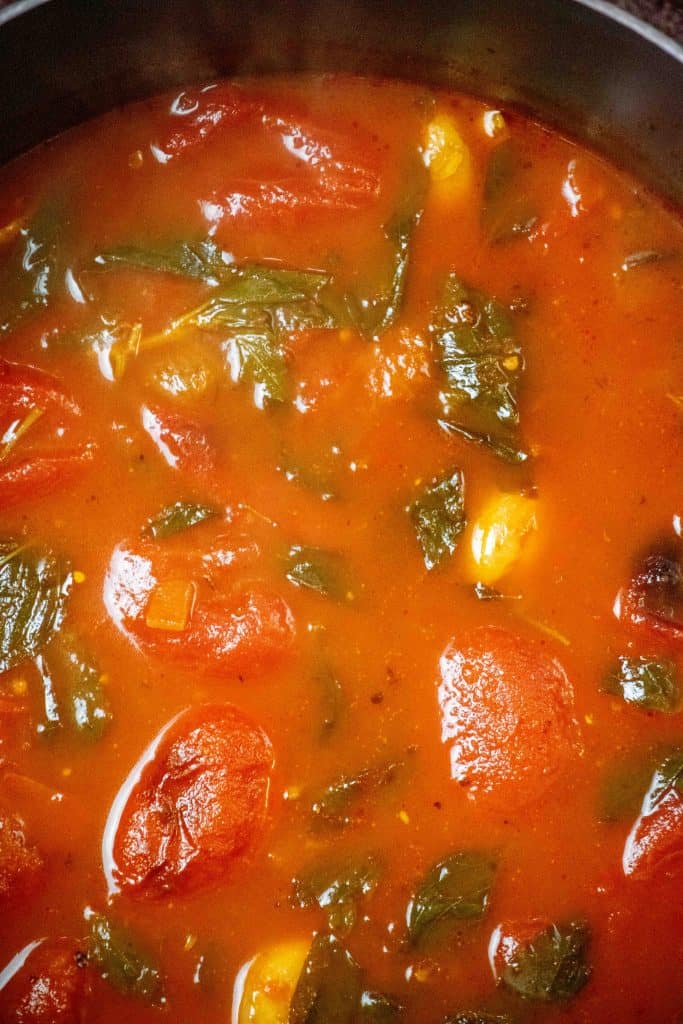 add roasted tomatoes directly to the pot, and simmer 15 minutes more