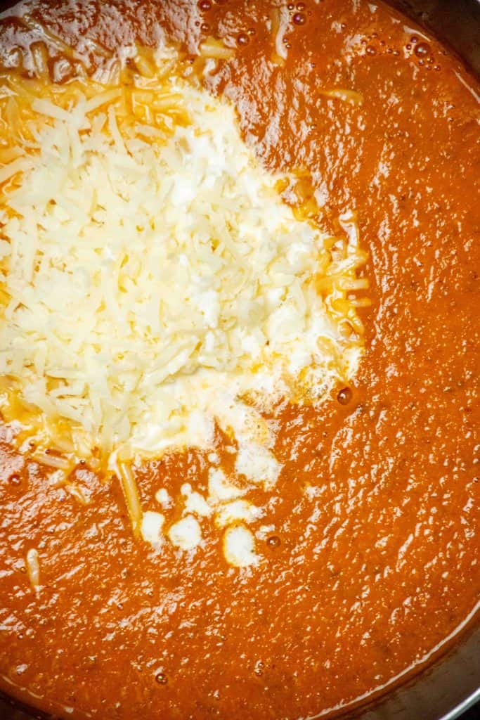 add the grated parmesan and cream