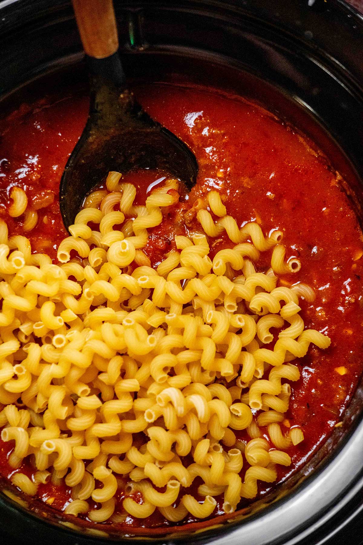 Add the pasta. Remove and discard the bay leaves. Stir in the pasta, cover, and cook until al dente, checking and stirring occasionally to prevent overcooking.