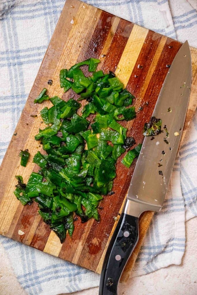 remove charred skin, stems, and seeds- and chop.