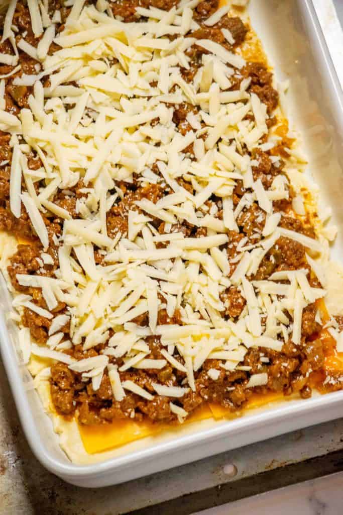 top with grated cheddar