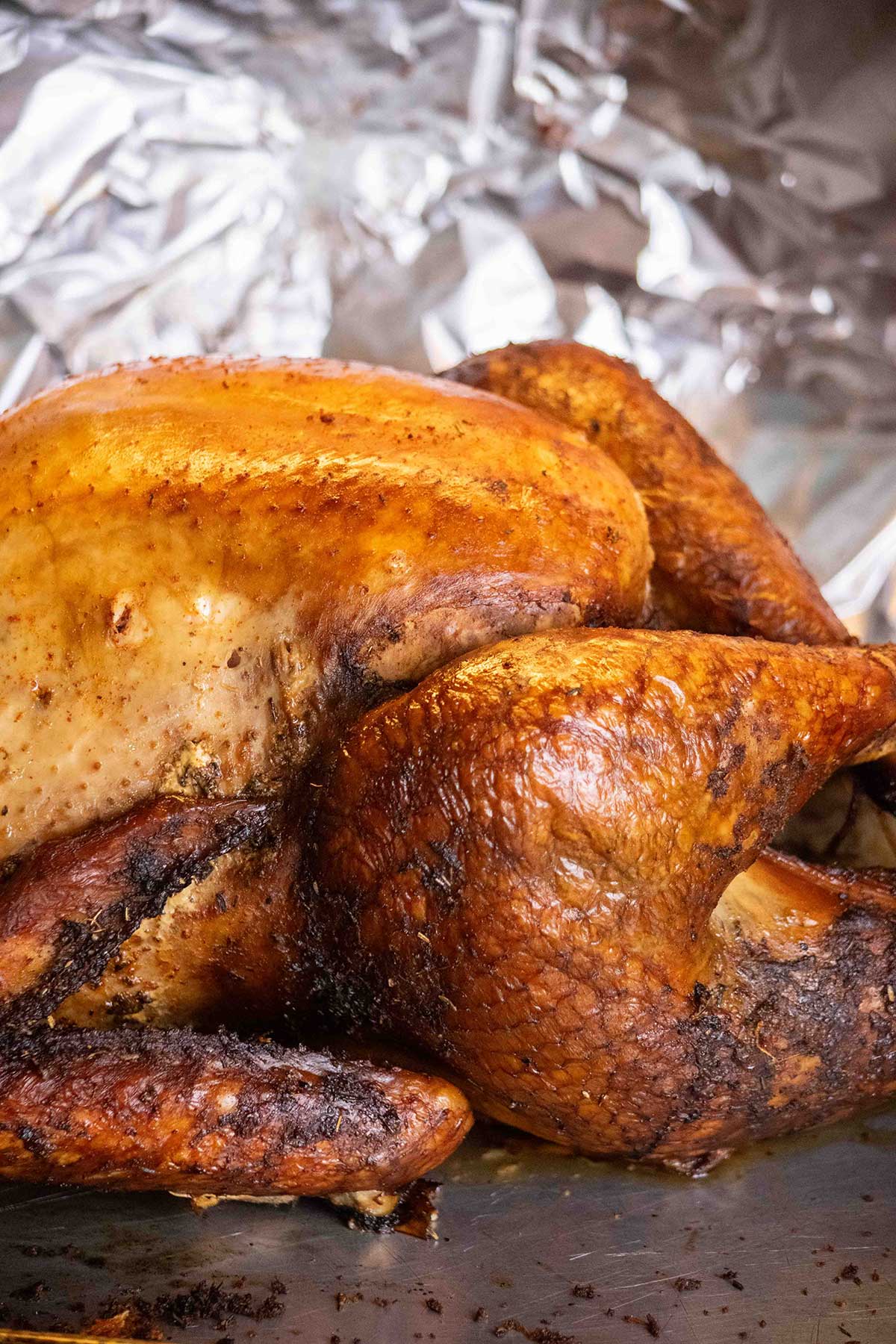 Rest before carving. Remove the turkey from the smoker, loosely tent with foil, and let it rest for at least 30 minutes before carving.