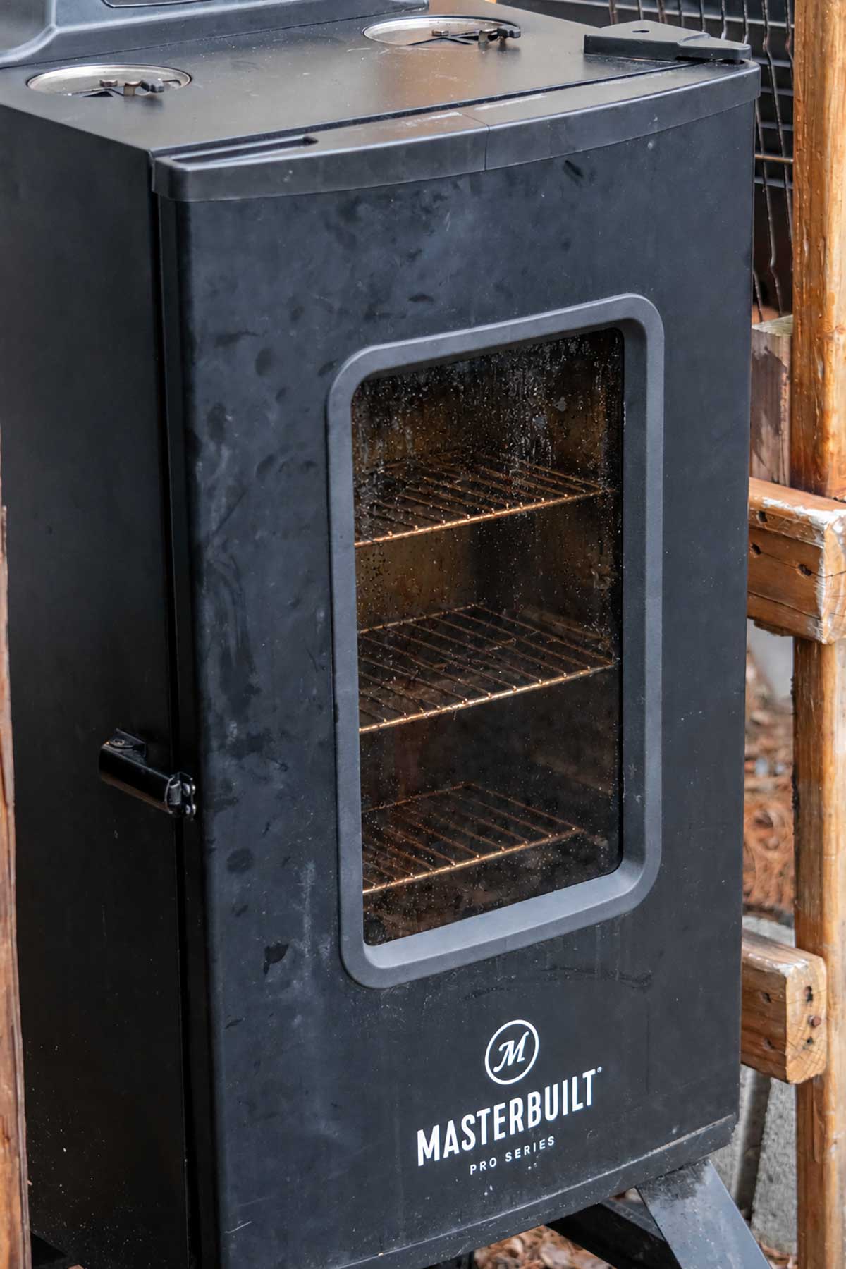 Preheat the smoker. Preheat your electric smoker to 225°F and add your wood chips. I like a combination of apple and pecan.