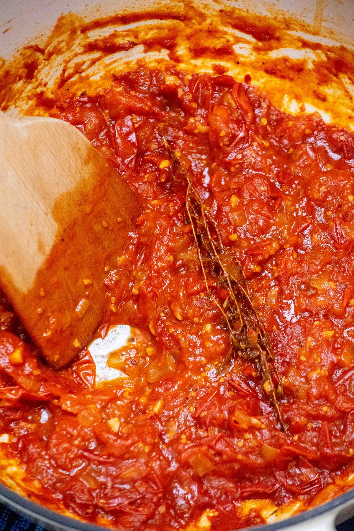 Once the jam is thickened to your desired consistency, remove the thyme sprigs, and discard. 
