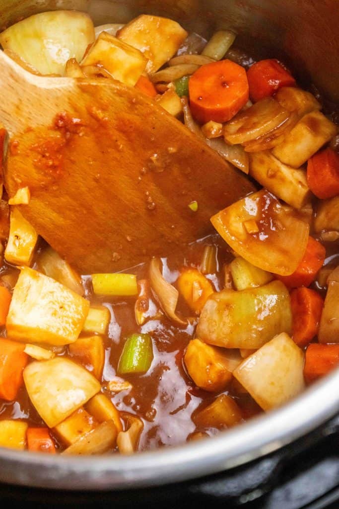 add wine and Worcestershire sauce, and scrape up all the browned bits from the bottom of the pot