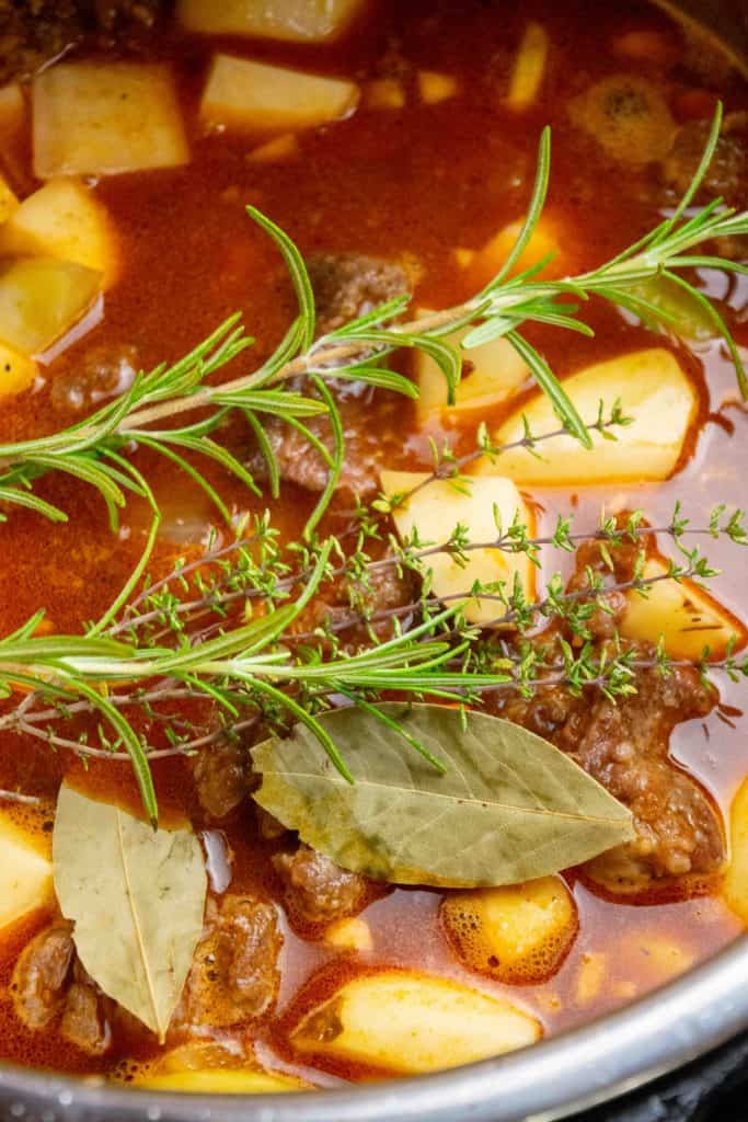 add remaining ingredients (except Kitchen Bouquet), close, and cook on high pressure. 