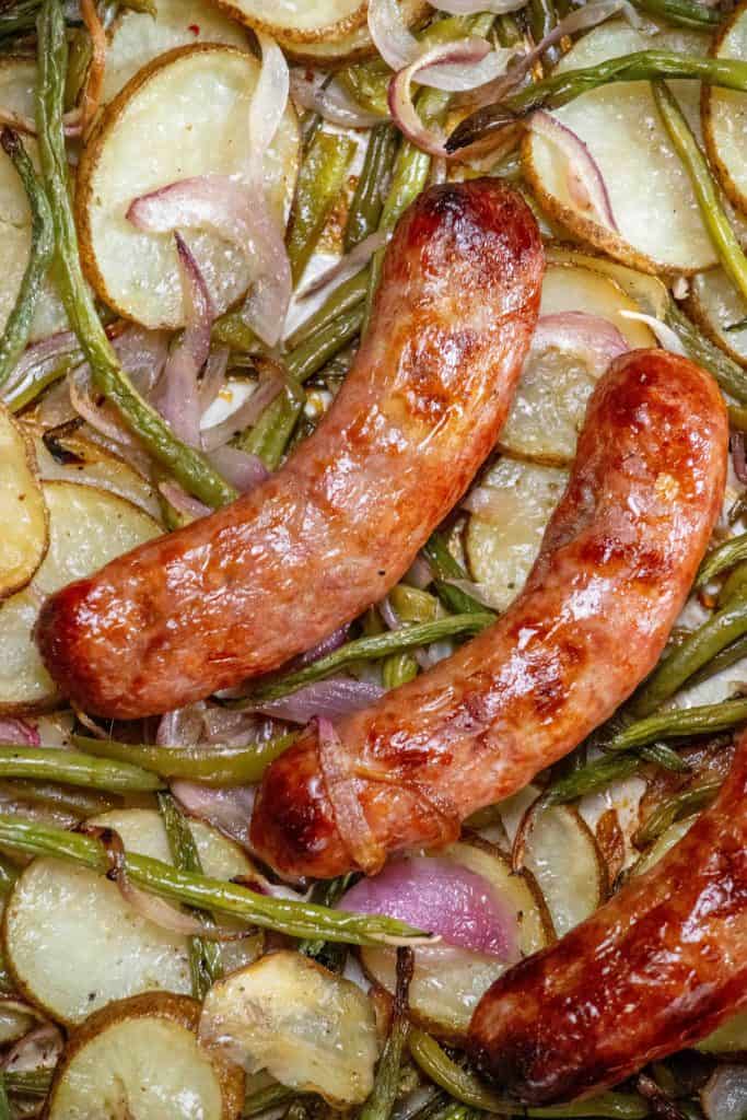 roast until veggies are tender and sausage is browned and cooked through, turning sausage once