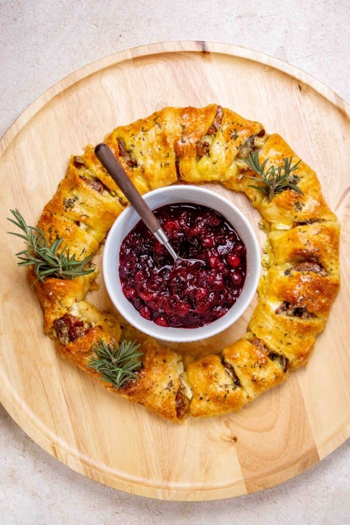 Once baked and cooled, arrange wreath on serving platter, and set compote bowl in the center