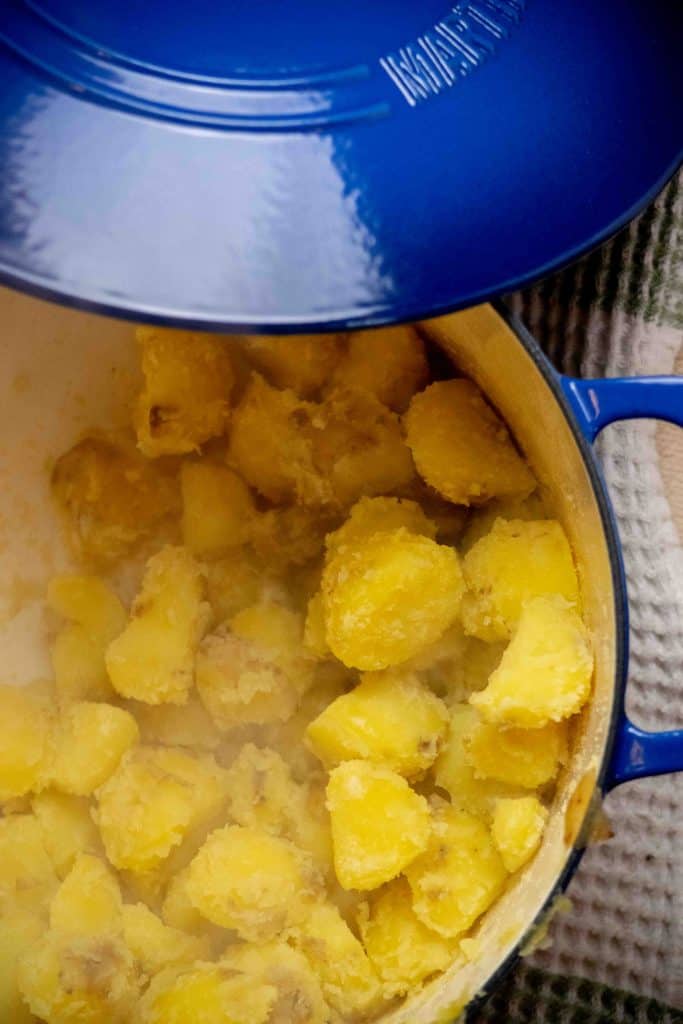 cover and shake briefly to create craggy bits on potatoes