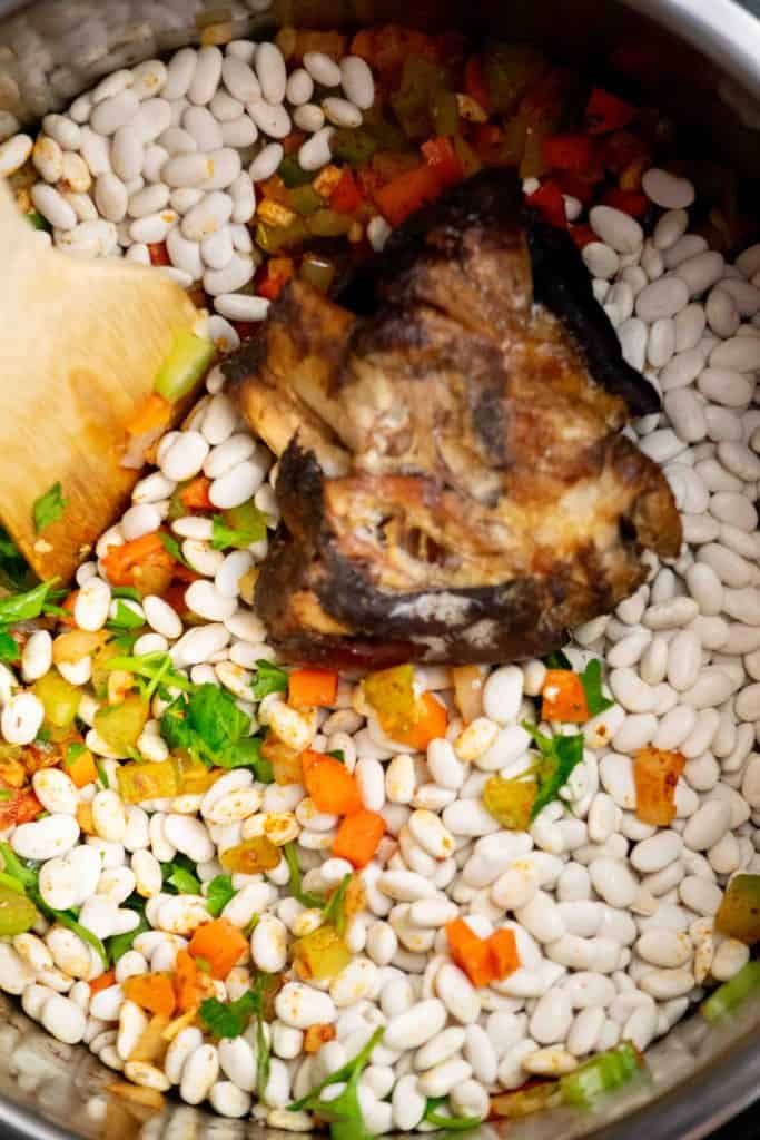 add beans, parsley, ham bone or hock