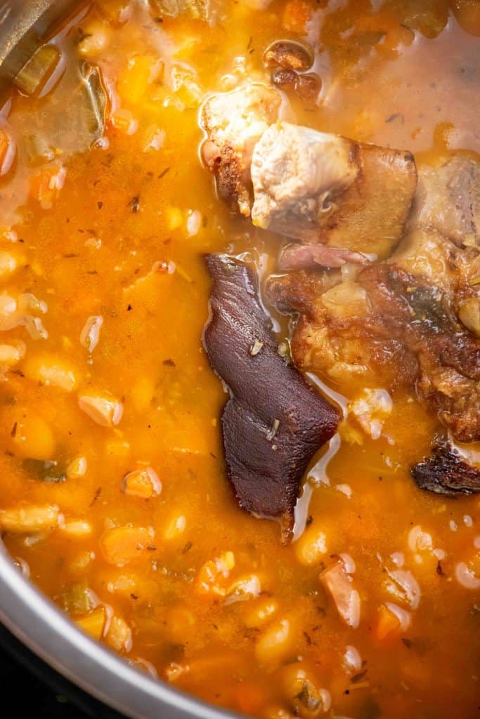 natural release for 20 minutes, then release pressure manually and remove bay leaves and ham hock