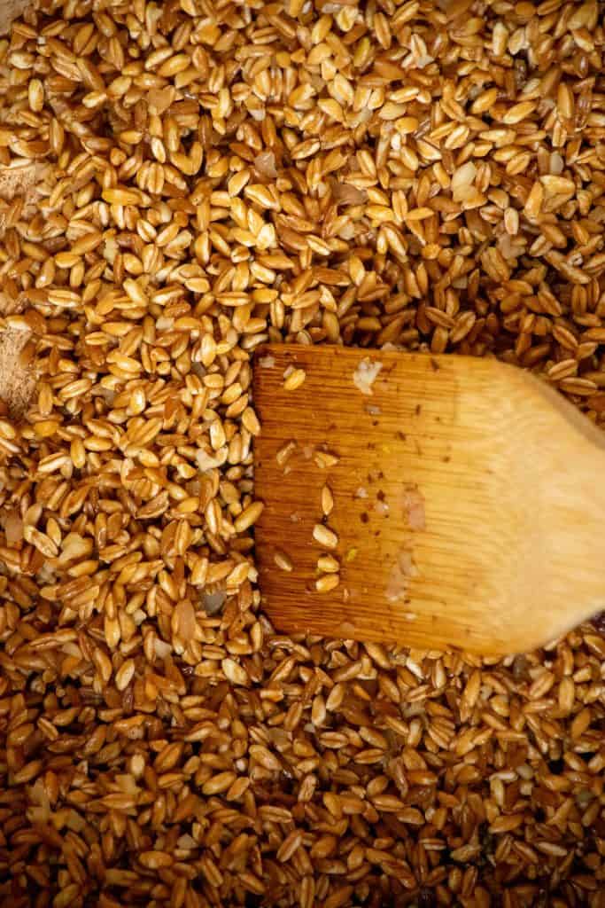 Add farro to pot and toast. 