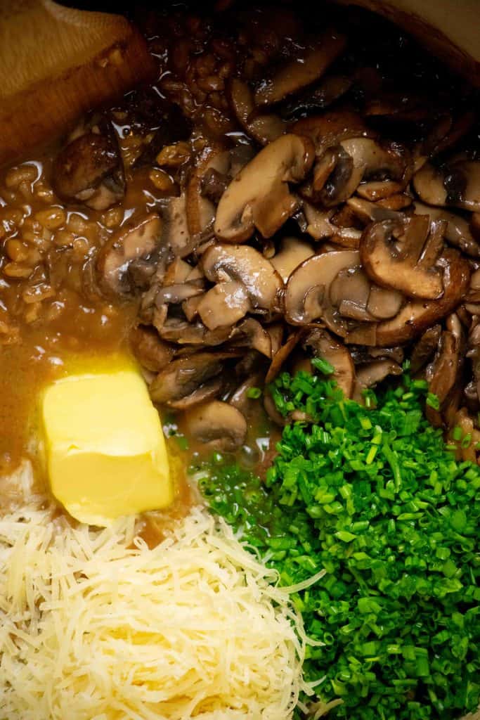 add butter, cooked creminis, chives, parmesan, and lemon juice. 