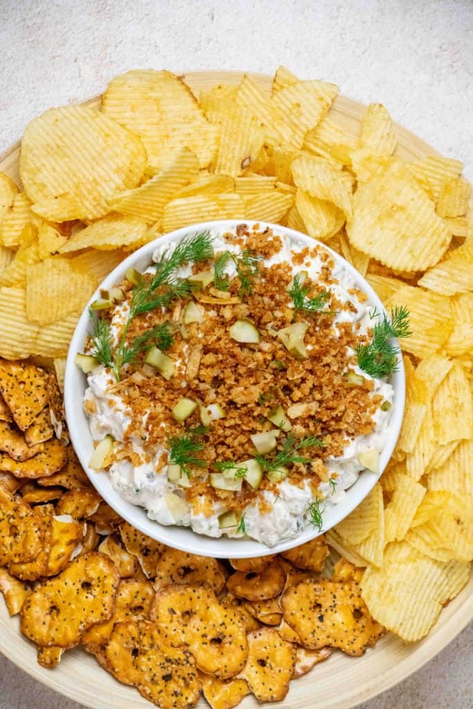 top with remaining crispy topping, garnish, and serve!