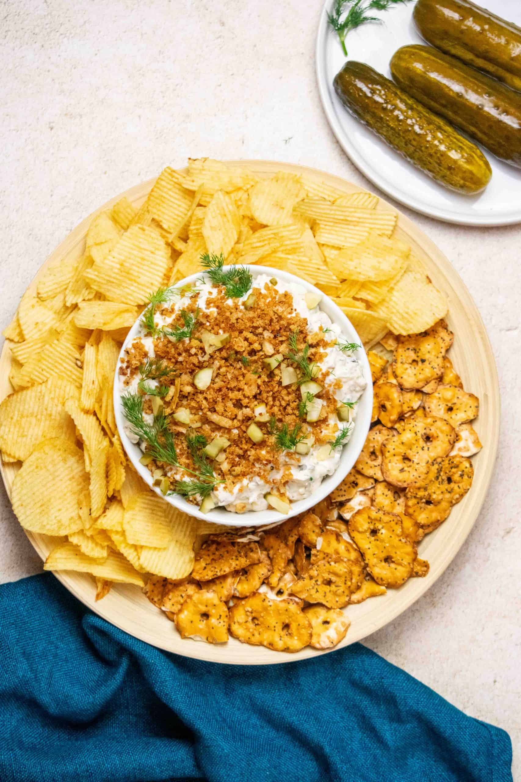 Ranch Fried Pickle Dip with Crispy Onion Topping with chips and pretzels