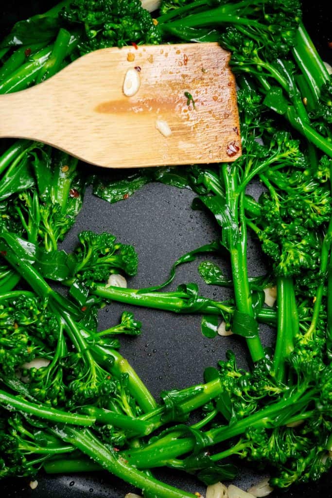 Add dried broccolini, salt and pepper to the hot skillet, and toss to coat