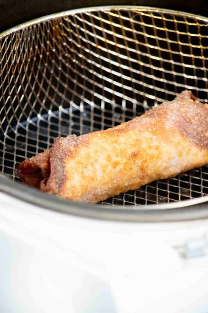 fry egg rolls until golden brown