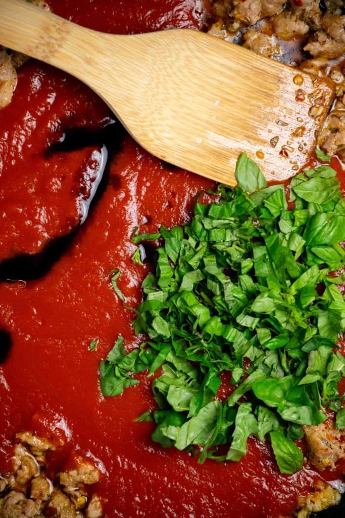 Add Passata, balsamic and basil. Simmer 10 minutes. 