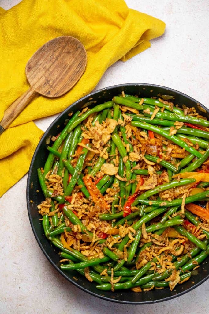top with additional crispy onions (if desired) and serve