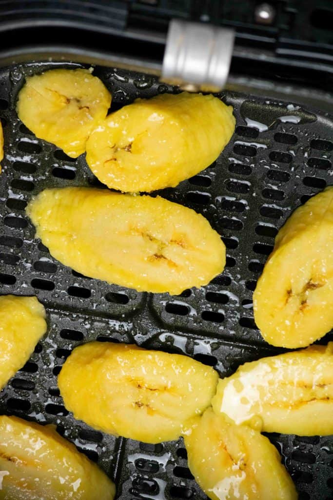 spray tops of plantains, and sprinkle with sugar and salt