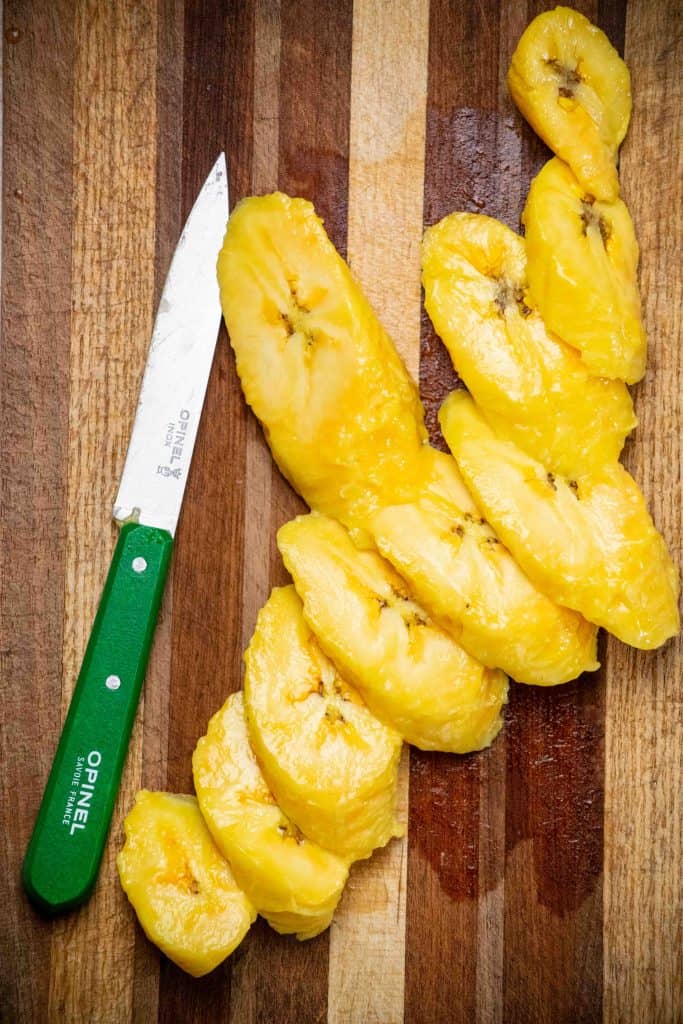 slice the plantains into ½" diagonal slices
