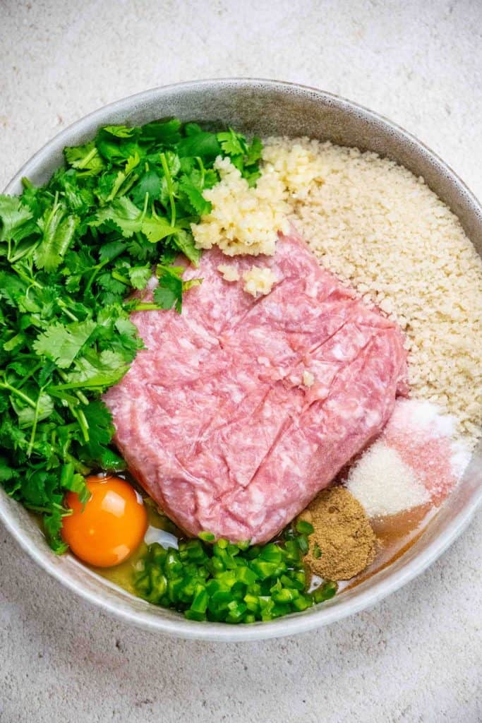 Add Mojo Meatball ingredients to a large bowl