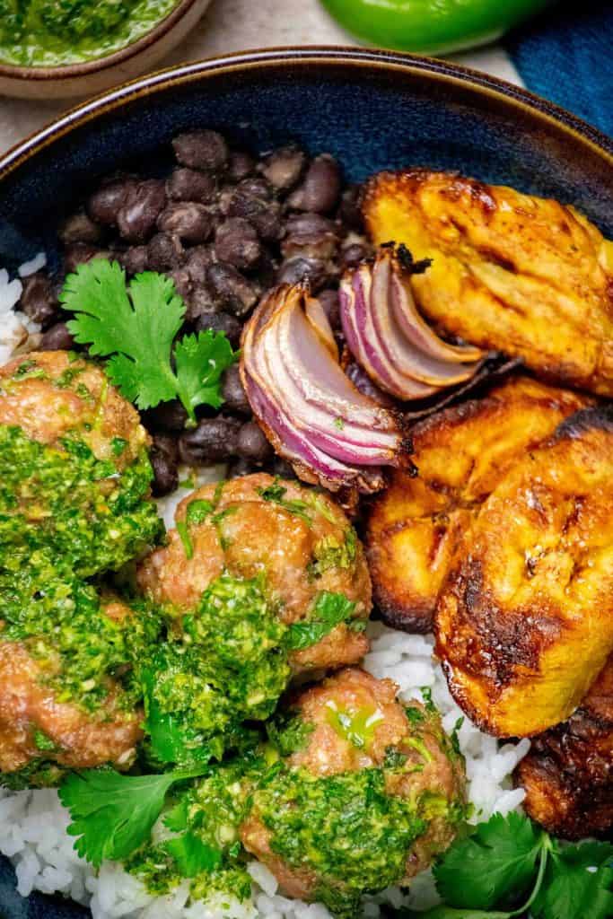 Remove meatballs from oven, arrange bowls and serve!