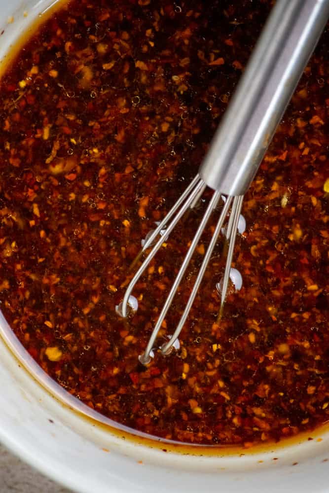 whisk dressing ingredients in a small bowl