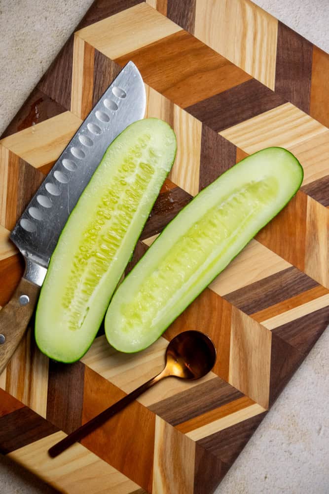 slice the cucumbers in half lengthwise, and remove the seeds