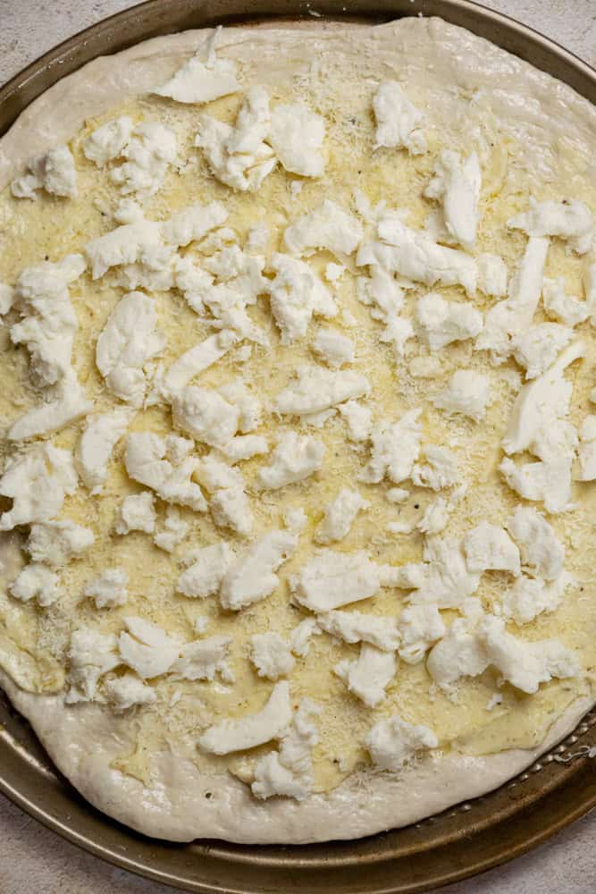 add parmesan and torn mozzarella