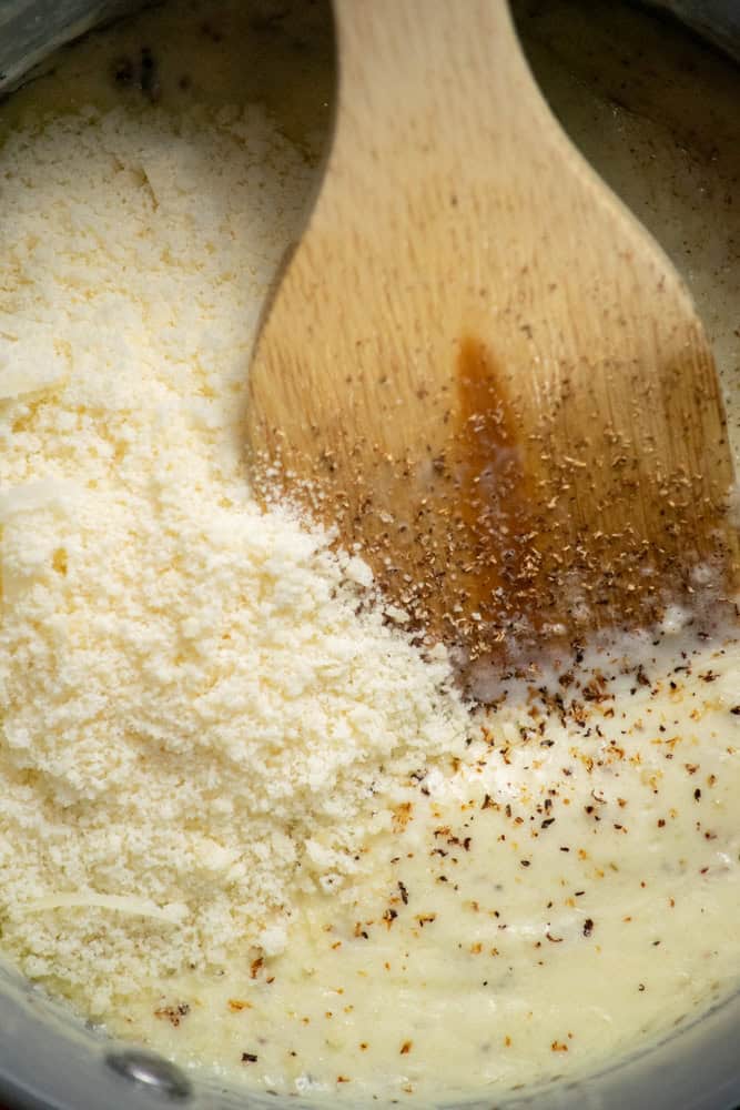 prepare the sauce, and fold in the parmesan cheese and nutmeg