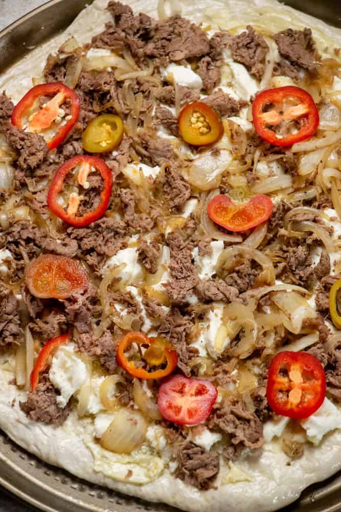 top with sliced cherry peppers