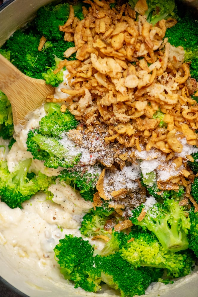 add broccoli, 1 cup of crispy onions, salt, pepper, and soy sauce