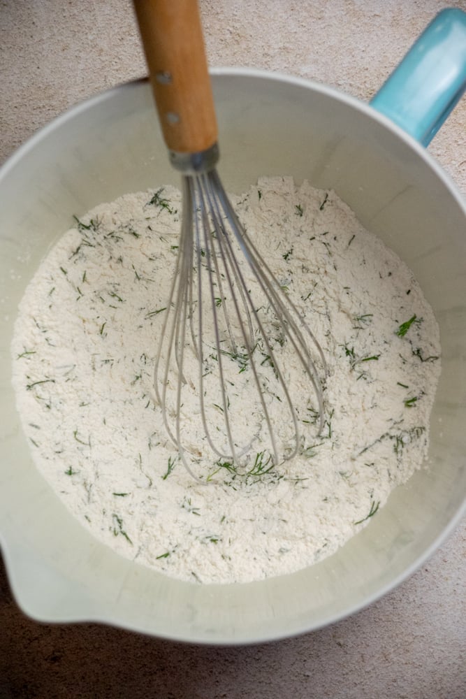 while chicken cooks, stir together dry ingredients for the dumplings