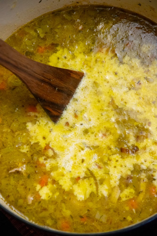 Add heavy cream to the pot and bring to a boil