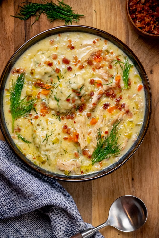 ladle soup into bowls, and garnish with pancetta and fresh dill