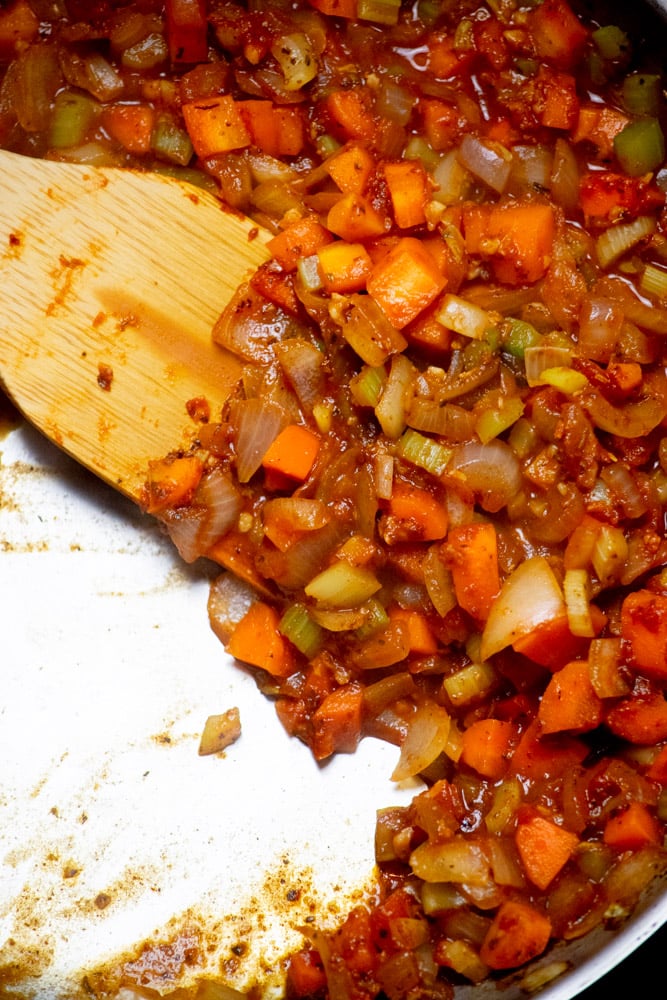 Deglaze the pan with water to loosen everything up. 