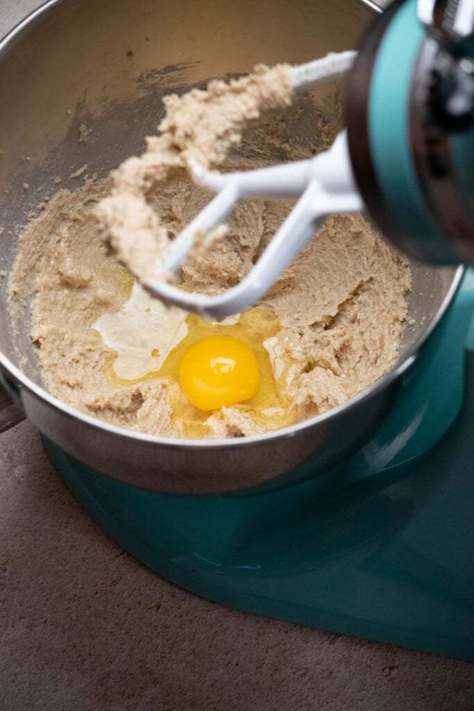 With your mixer running on low-medium, add the eggs, one by one, until fully incorporated.