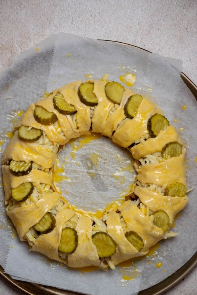 brush the Crescent Ring evenly with the egg wash until well coated. 
