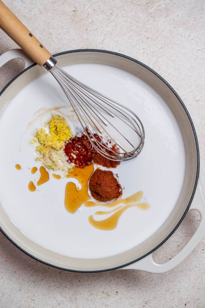 Preheat your oven, and whisk sauce ingredients together right in your baking pan.